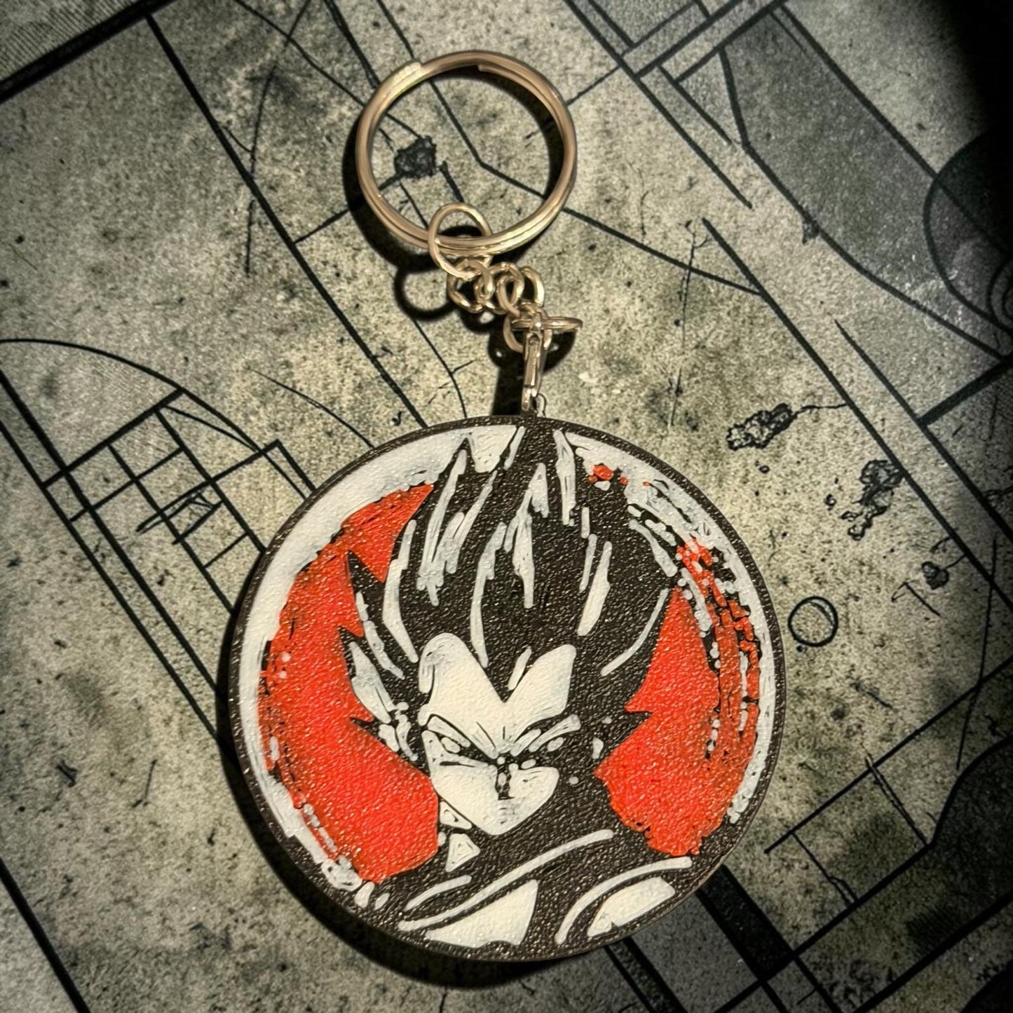 Porte-clés anime rouge noir et blanc