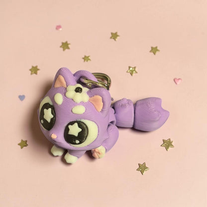 Porte-clés kawaii chat violet avec fleurs