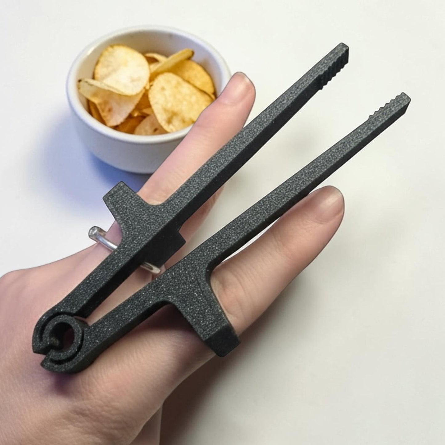 Baguette pour doigts geek personnalisable en impression 3D pour manger des chips sans se salir les doigts