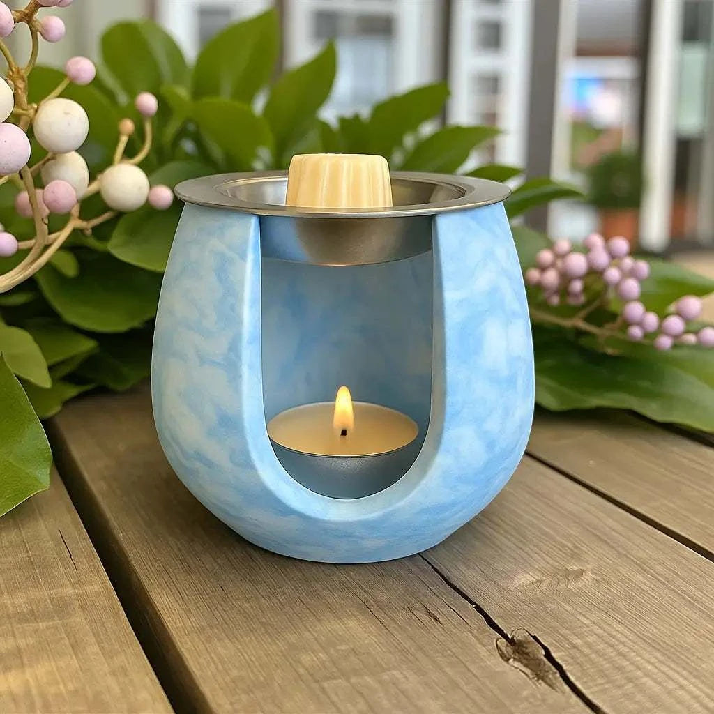 Brûleur à parfum en jesmonite bleu ciel avec effet nuage doux et artisanal