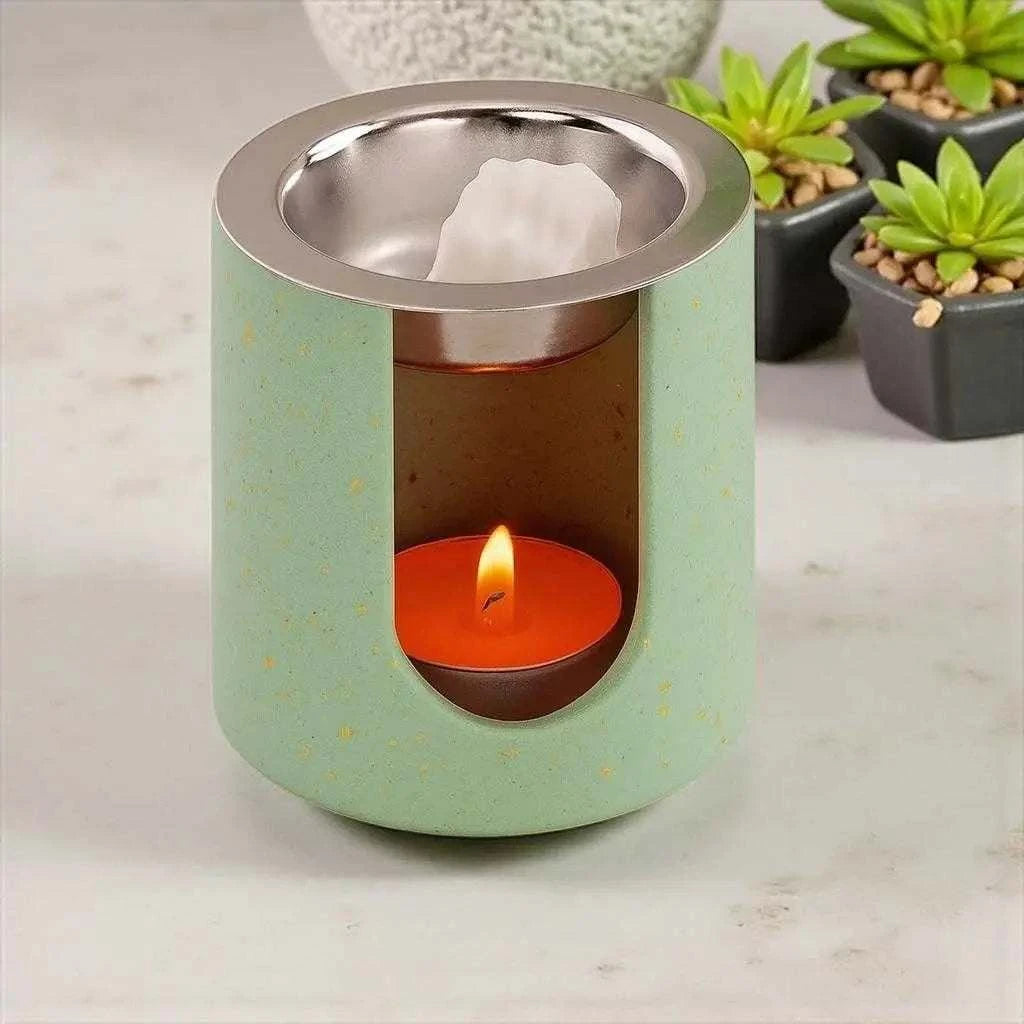 Brûleur à parfum rond vert clair avec paillettes dorées artisanal et élégant.