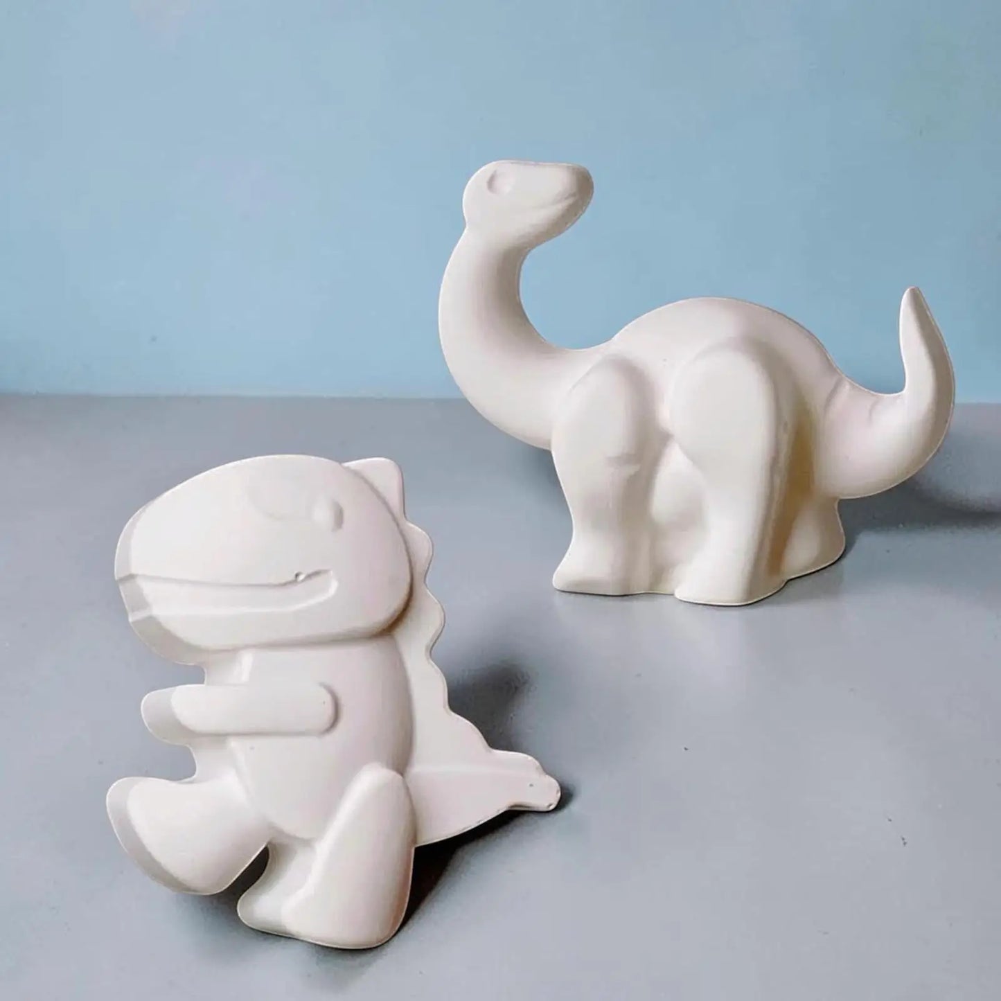 Figurines Brachiosaure et T-Rex kawaii à peindre activité créative dinosaure