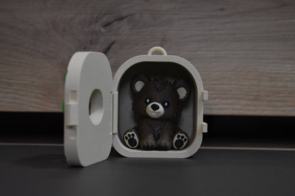 Pocket Pals Ours ouvert avec figurine amovible à l'intérieur