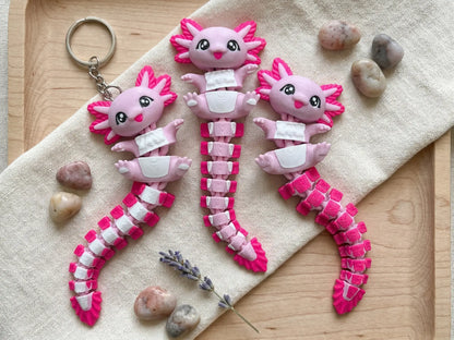 Détails du porte-clé axolotl avec grands yeux et branchies roses