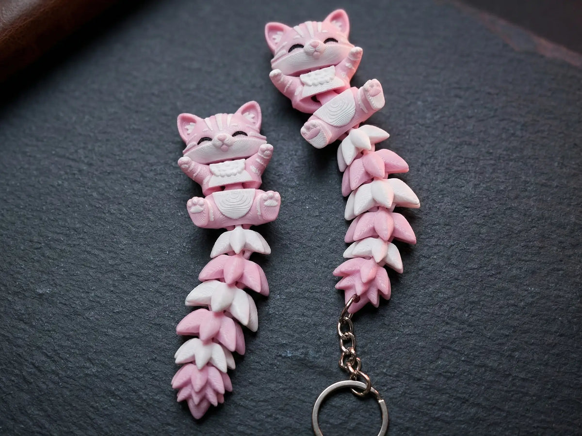 Porte-clé chat articulé 3D de 12 cm avec longue queue flexible