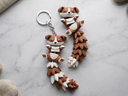 Porte-clés chien articulé Flexi marron et crème imprimé en 3D