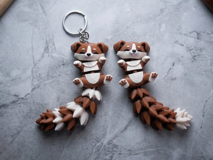 Porte-clés chien Flexi avec corps et longue queue articulés