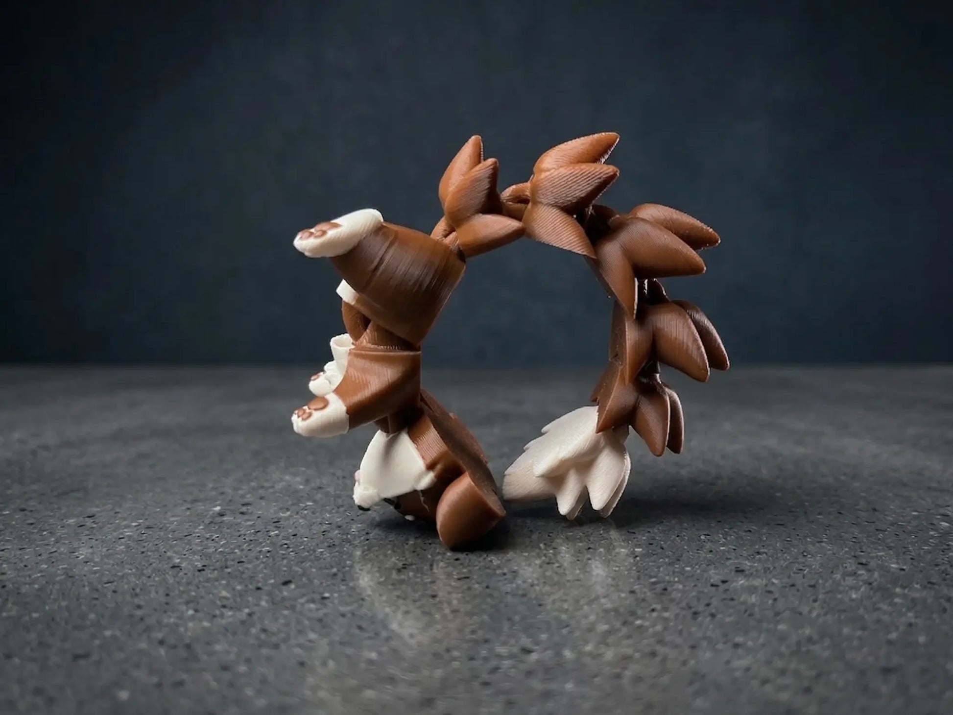 Petit chien articulé Flexi en rond