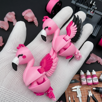Deux flamants roses articulés en impression 3D avec ailes déployées