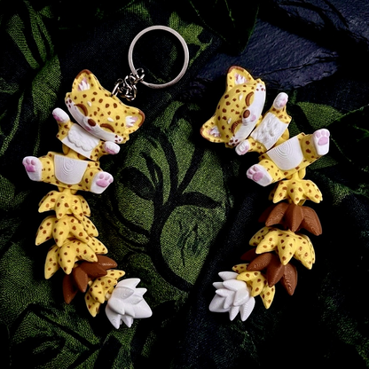 Porte-clés guépard articulé Flexi jaune et marron imprimé en 3D
