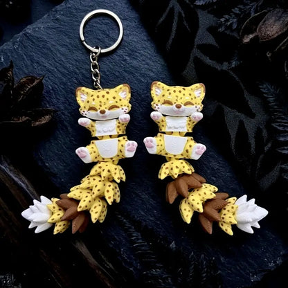 Porte-clés guépard articulé Flexi jaune et marron imprimé en 3D