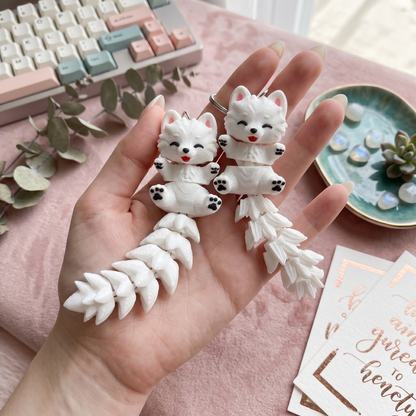 Deux porte-clés Samoyèdes articulés kawaii avec queues Fluffy arrondie et à pétales