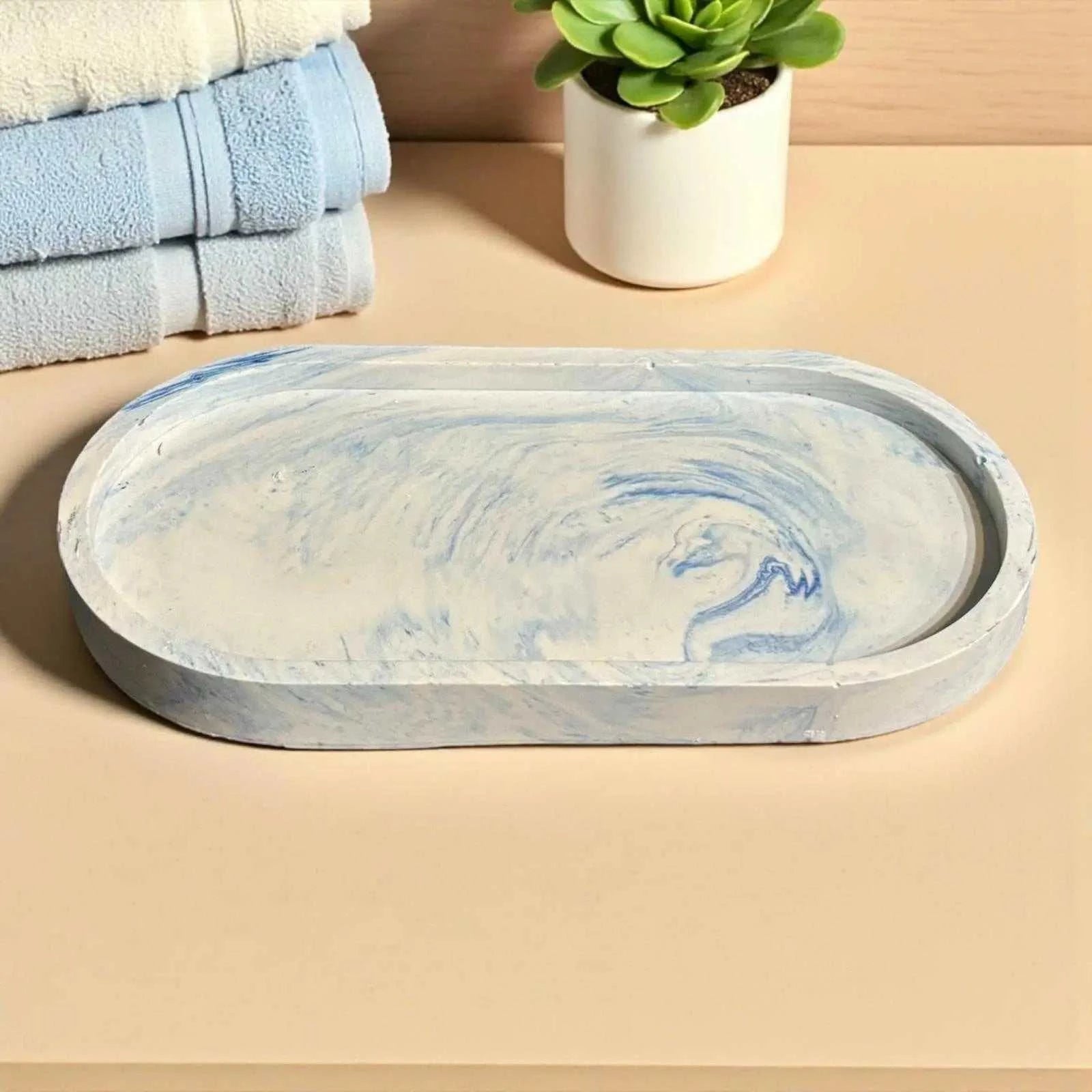 Vide-poche ovale en Jesmonite bleu et blanc marbré fait main en France