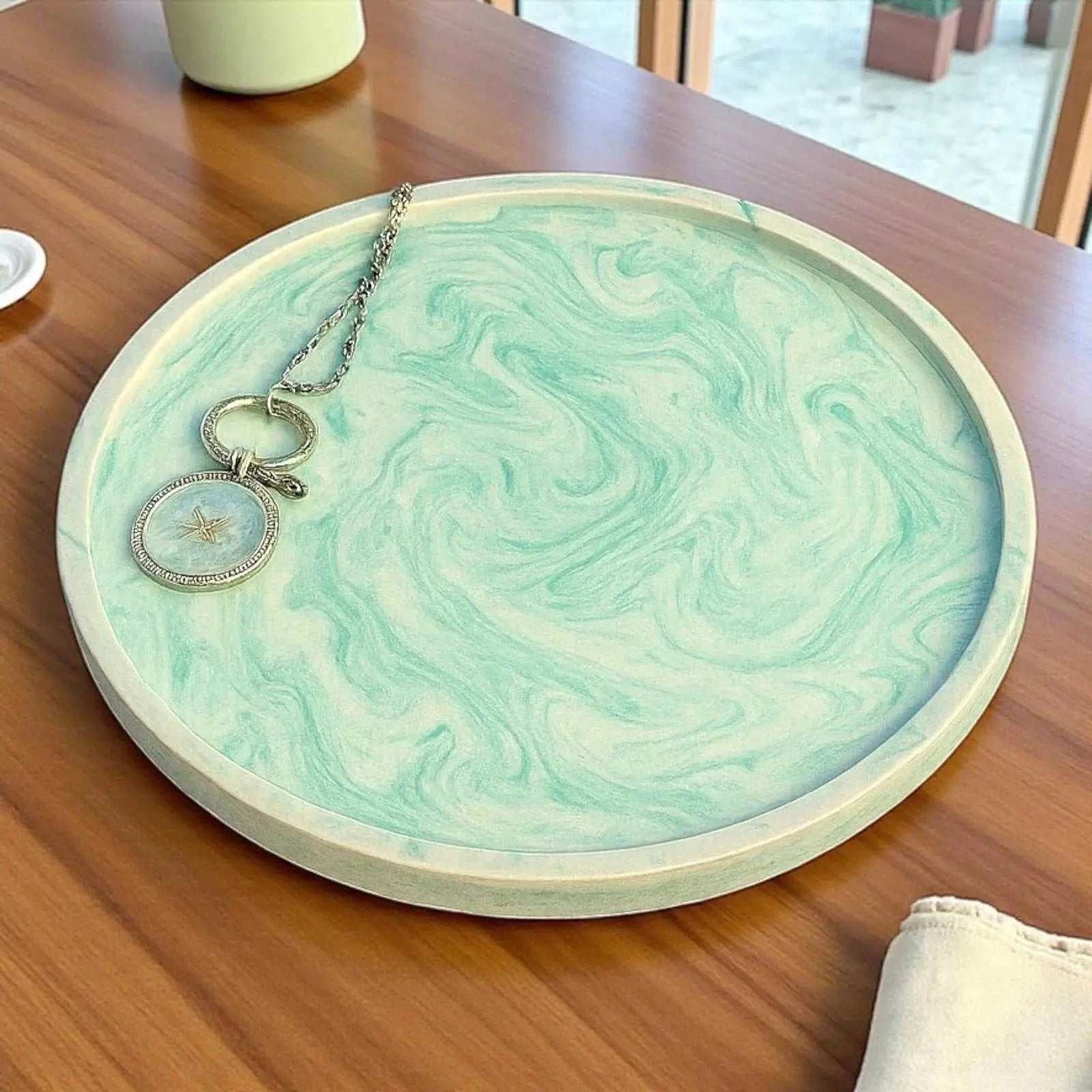 Vide-poche rond vert d’eau marbré en Jesmonite, décor zen et naturel, création artisanale française.